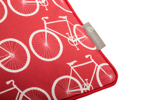 bike scatter cushion in bold red 